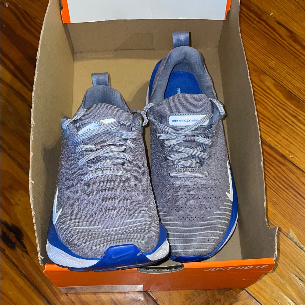 Nike Gray Sneakers with Blue Accents